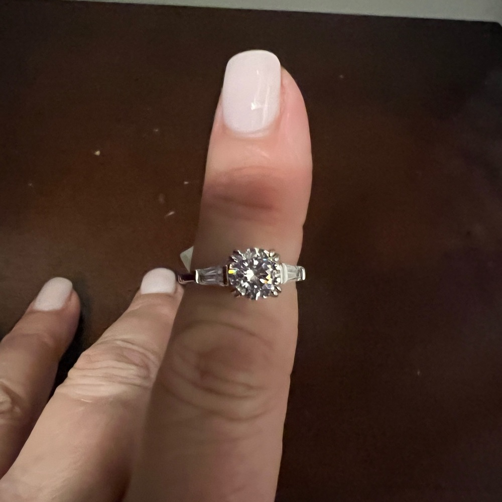 CZ 1 ct round with side baguettes size 6
